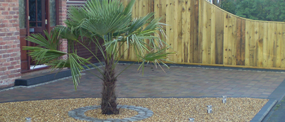 Block paved driveway and gravel garden